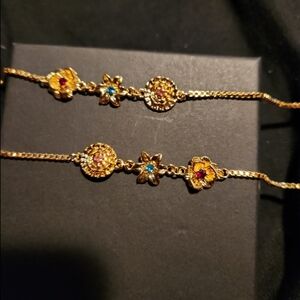 Elegant Gold and Red Floral Bracelet